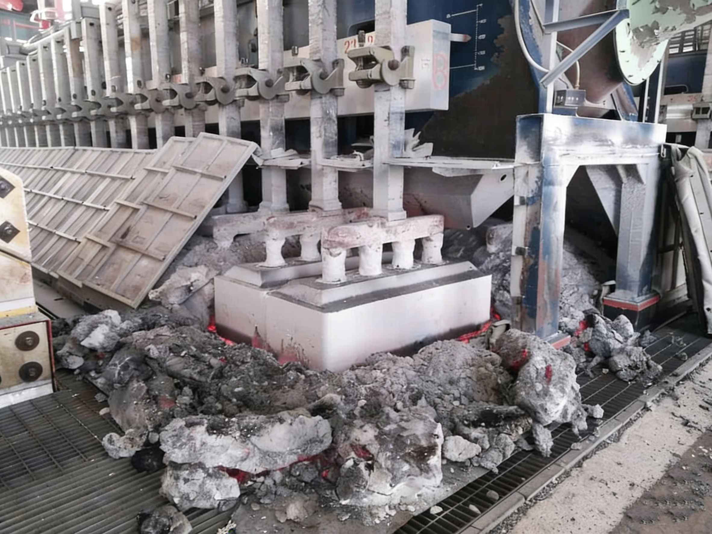 the coated anode is placed into the aluminum electrolytic cell.